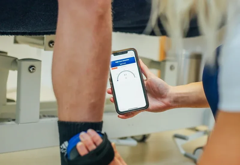 Physiotherapist conducting an initial assessment and diagnosis, providing hands-on treatment and personalized exercises for recovery.